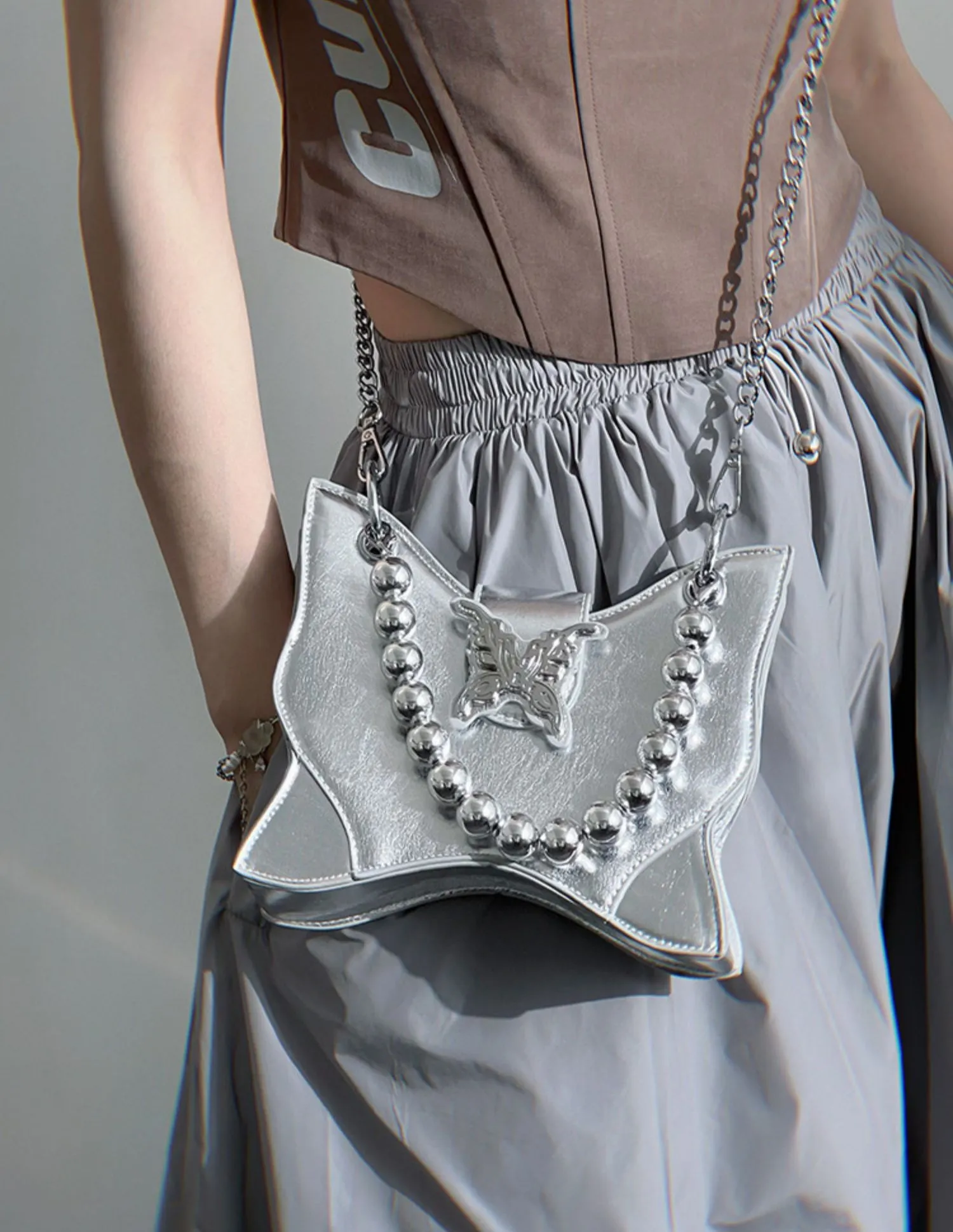 Mariposa Silver Butterfly Wings Shaped PU Leather Solid Color Textured Wide Shoulder Bag Handbag