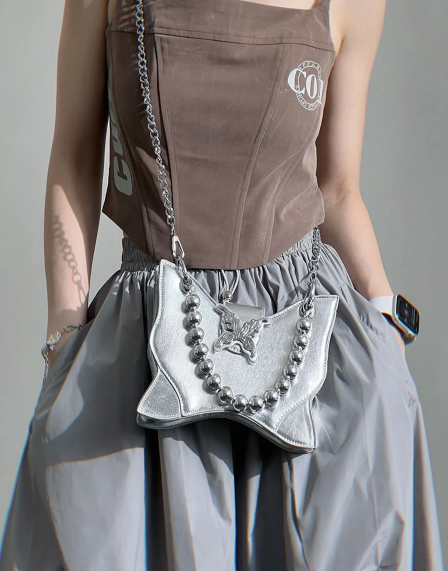 Mariposa Silver Butterfly Wings Shaped PU Leather Solid Color Textured Wide Shoulder Bag Handbag