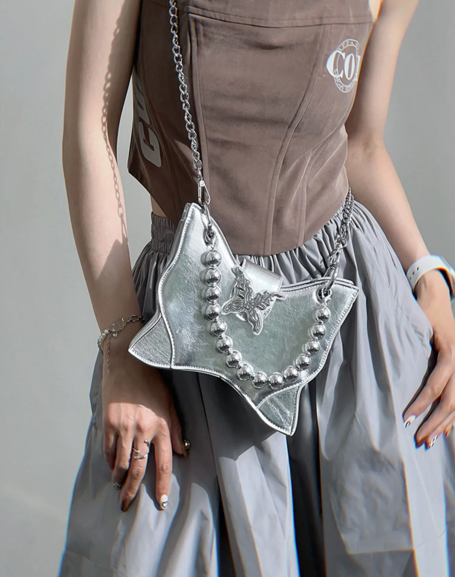 Mariposa Silver Butterfly Wings Shaped PU Leather Solid Color Textured Wide Shoulder Bag Handbag