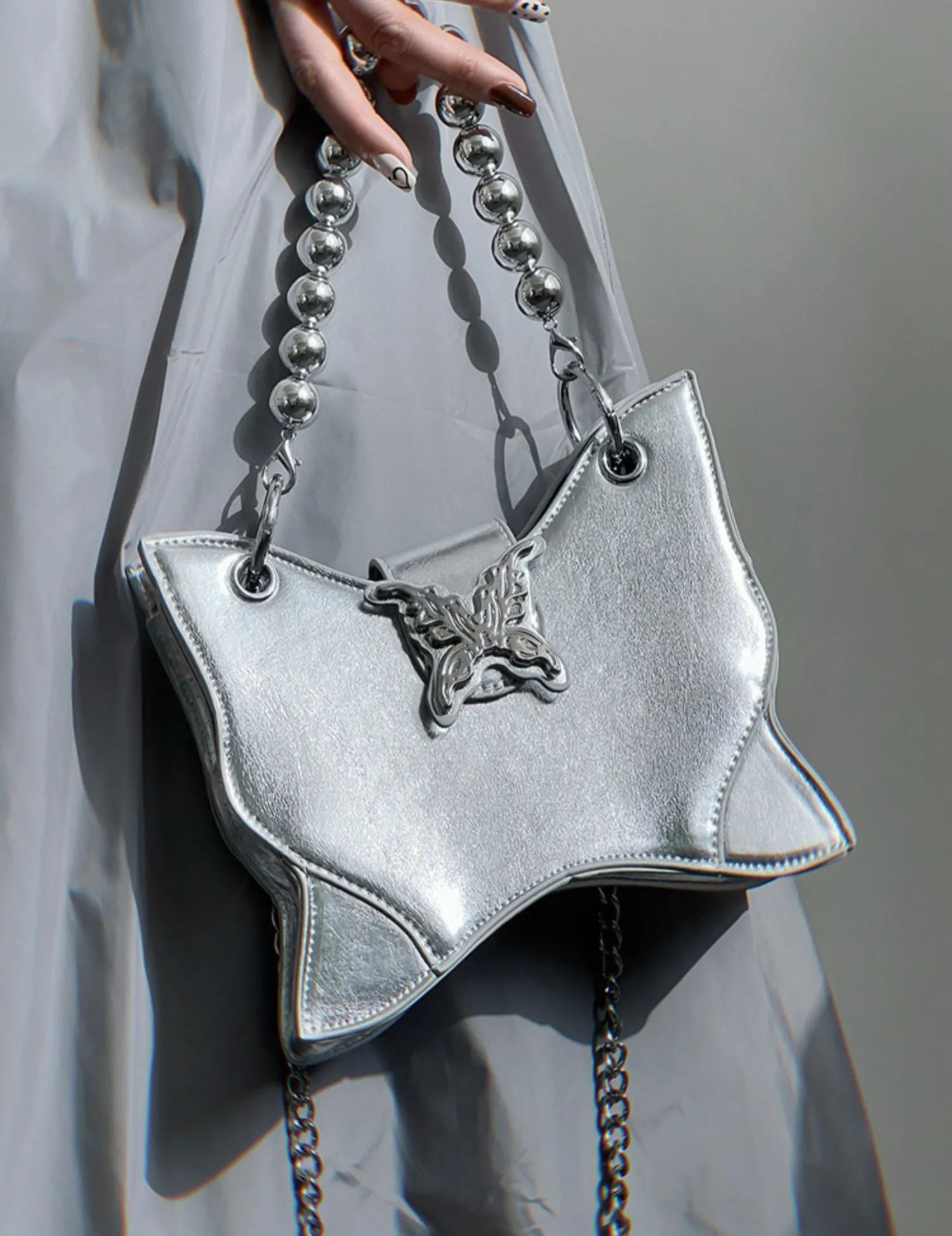 Mariposa Silver Butterfly Wings Shaped PU Leather Solid Color Textured Wide Shoulder Bag Handbag