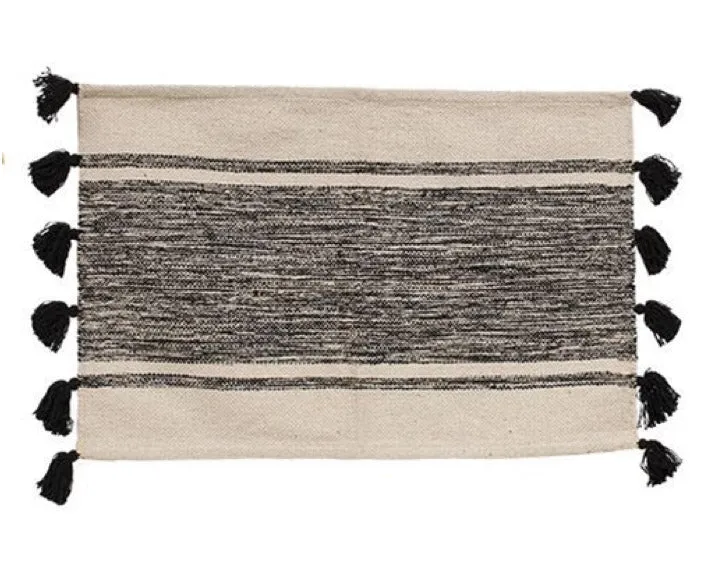 Modern black striped tassel accent rug