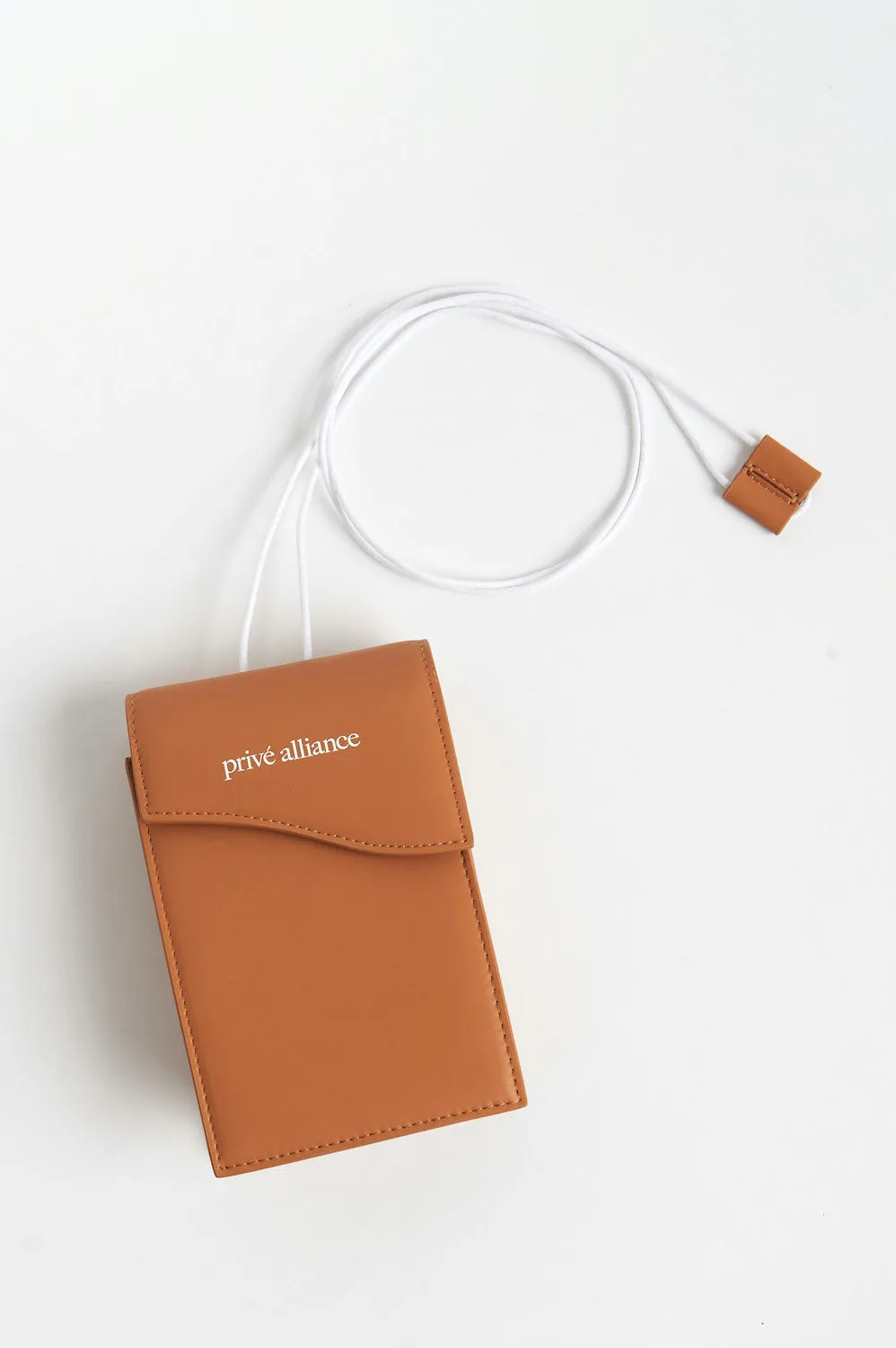 NECESSITY POUCH BAG - CAMEL