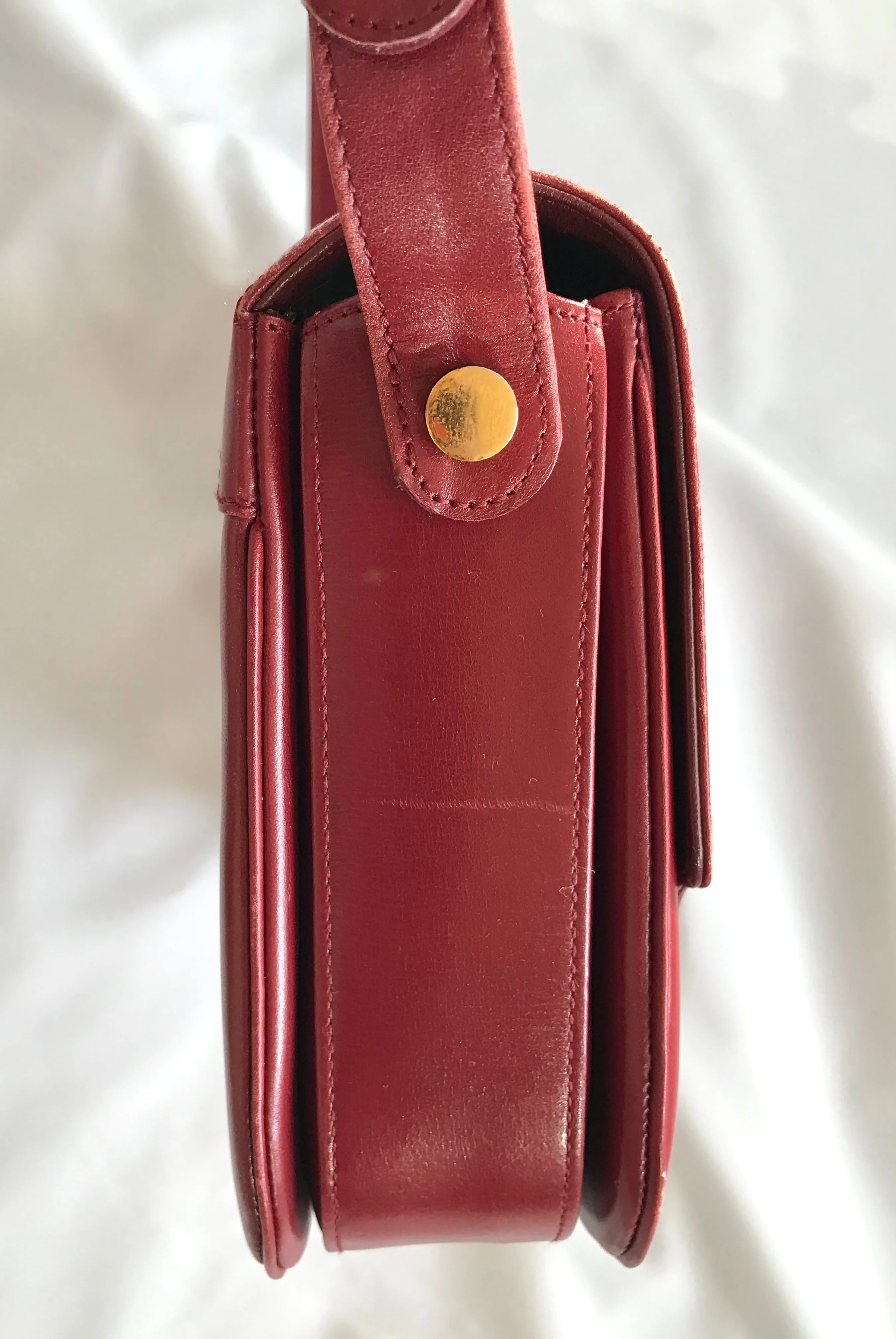 Vintage Lanvin wine leather shoulder bag with golden logo motif closure. Classic must have purse. 060620r2