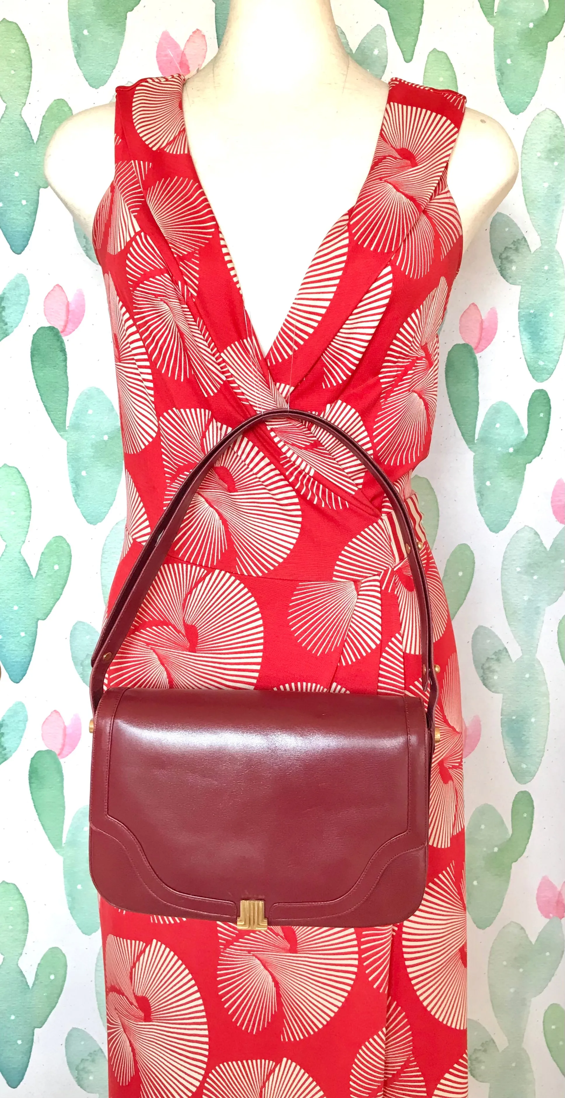 Vintage Lanvin wine leather shoulder bag with golden logo motif closure. Classic must have purse. 060620r2