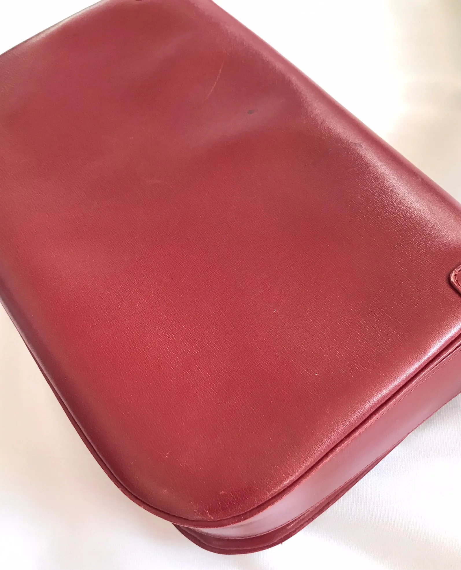 Vintage Lanvin wine leather shoulder bag with golden logo motif closure. Classic must have purse. 060620r2