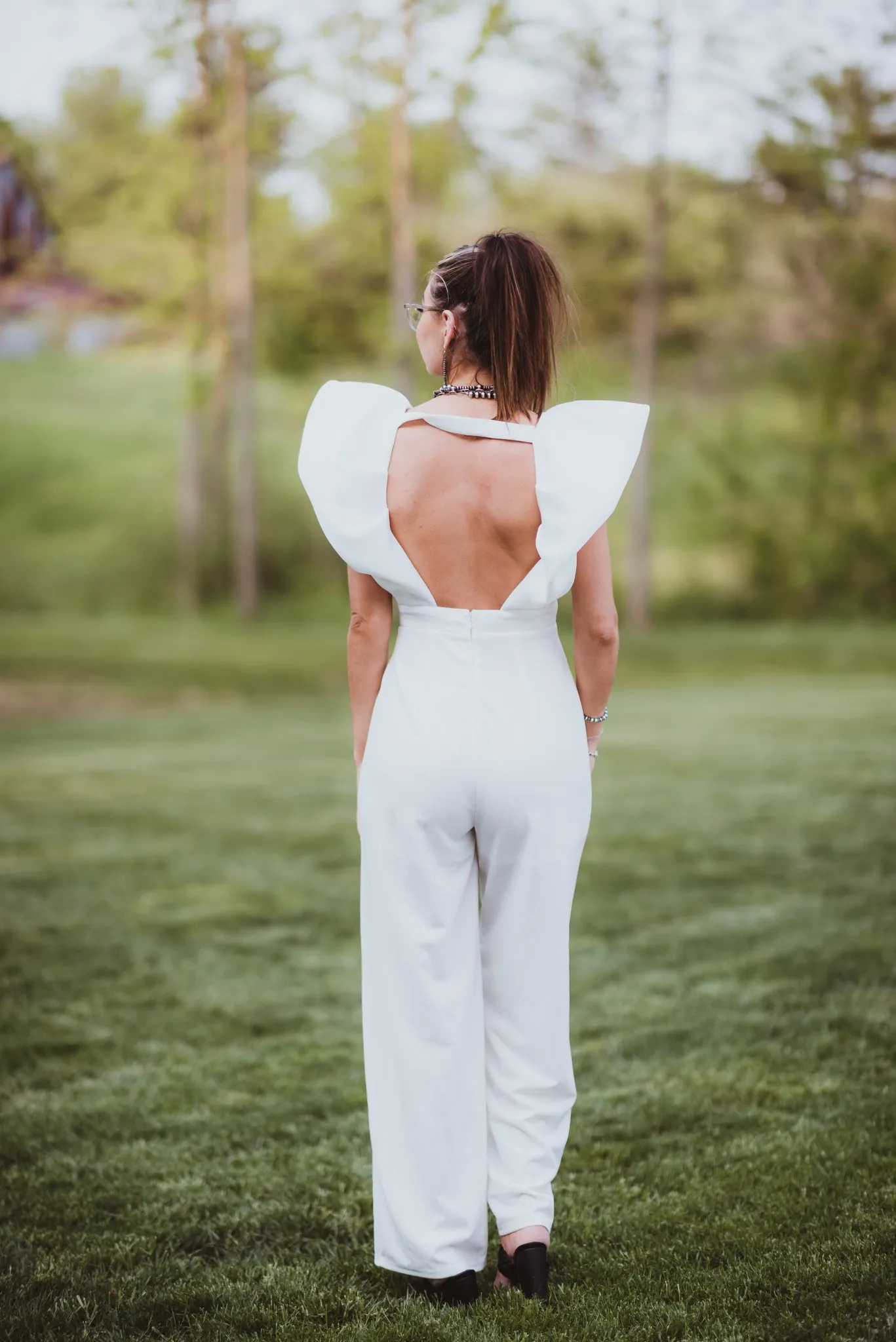 White Luxe Jumpsuit with Zipper Back   Puff Sleeve