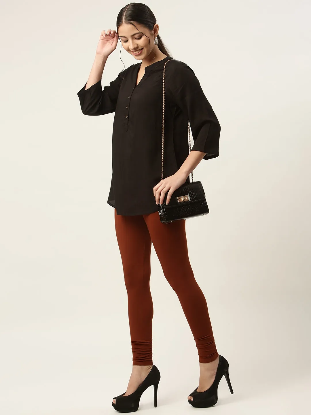 Women Rust Churidar-Length Leggings